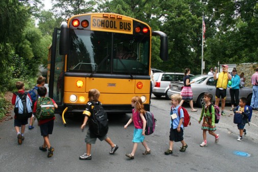 children-boarding-school-bus